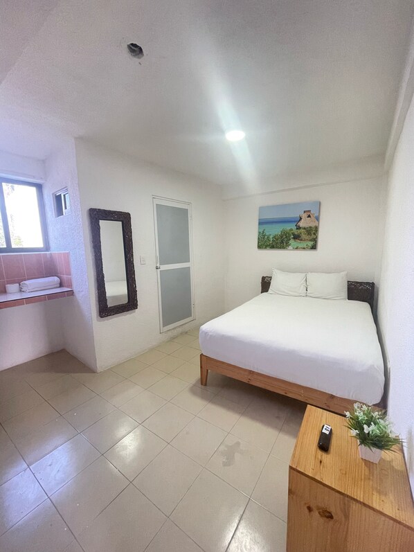 Basic Studio Suite, 1 Double Bed | Iron/ironing board, free WiFi, bed sheets - Hotel Casa Caracol (Isla Mujeres)