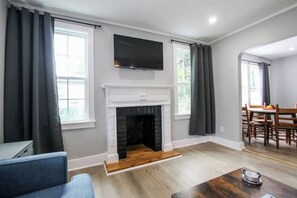 Living area - Midtown Retreat / Sunny 2BR Duplex Stay (Savannah)