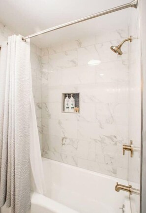 Hair dryer, towels, soap, toilet paper