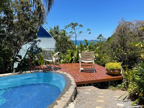 Pyramid house covered in quartz. Space for healing and regeneration connections.