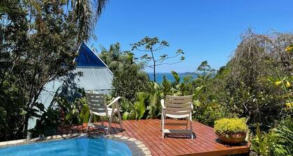 Pyramid house covered in quartz. Space for healing and regeneration connections.