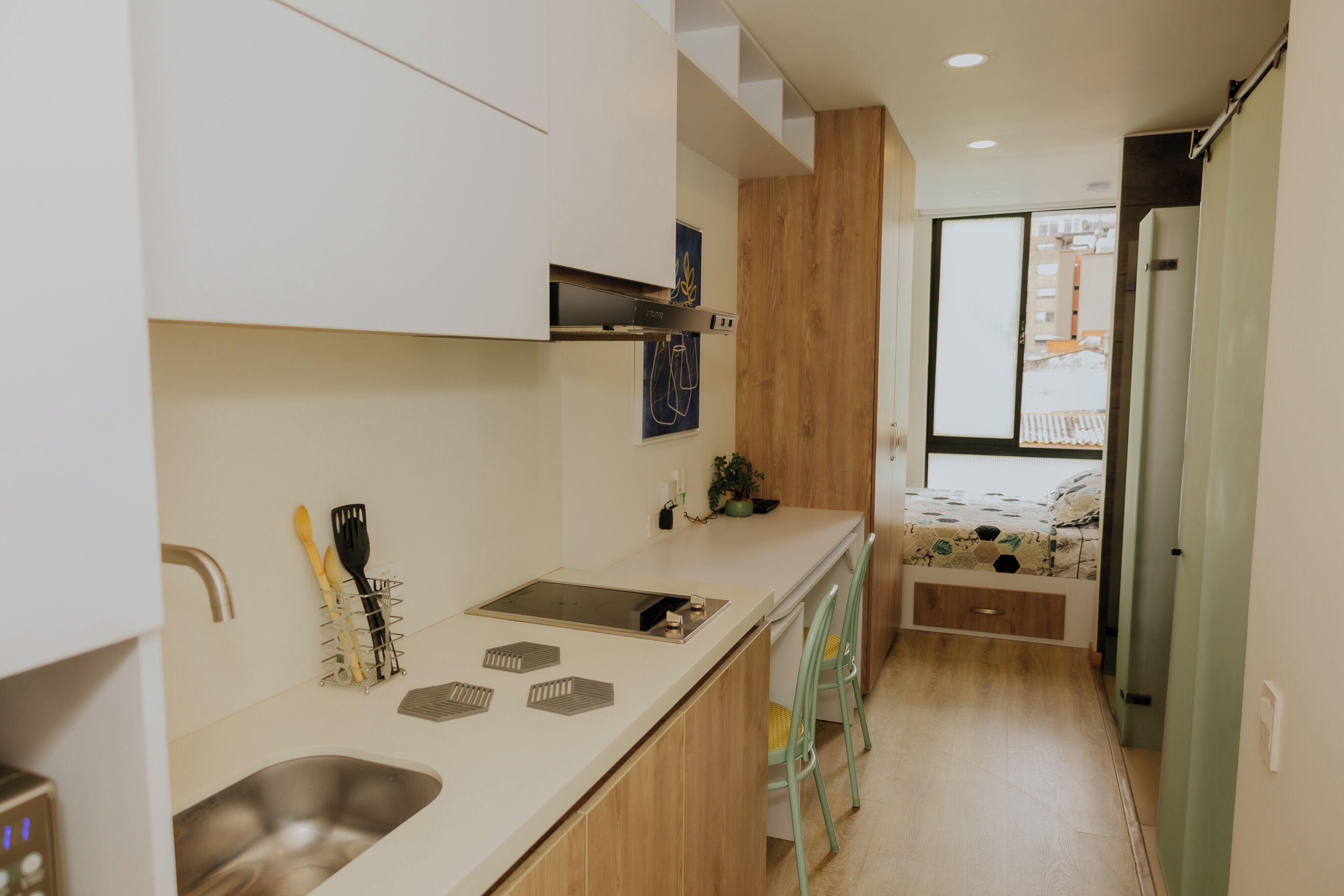 Fridge, microwave, coffee/tea maker, cookware/dishes/utensils