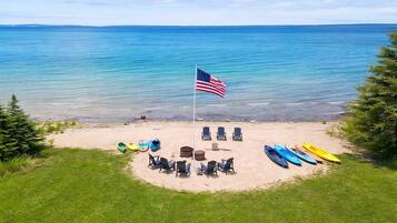 On the beach, sun-loungers