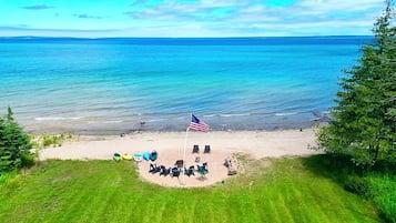 On the beach, sun-loungers