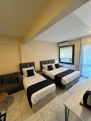 Superior Triple Room, Smoking, Balcony | Premium bedding, minibar, laptop workspace, soundproofing