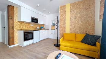 Design Apartment | 1 bedroom, laptop workspace, blackout drapes, iron/ironing board