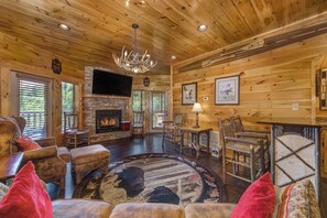 Cabin, Multiple Beds, Hot Tub, Mountain View (Knotty But Nice) | Living area | 42-inch flat-screen TV with digital channels, fireplace