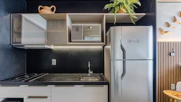 Fridge, microwave, cookware/dishes/utensils, dining tables