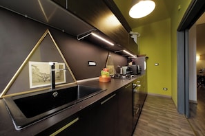 Departamento | Cocina privada | Cafetera de espresso, tetera eléctrica y tostadora 