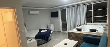 Deluxe Suite, Balcony, Sea View | 1 bedroom