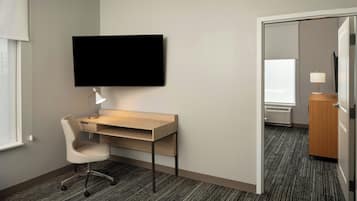 Suite, 1 Bedroom, Non Smoking | Desk, laptop workspace, iron/ironing board, free cribs/infant beds