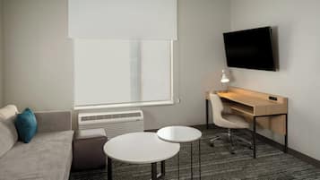 Suite, 1 Bedroom, Non Smoking | Desk, laptop workspace, iron/ironing board, free cots/infant beds
