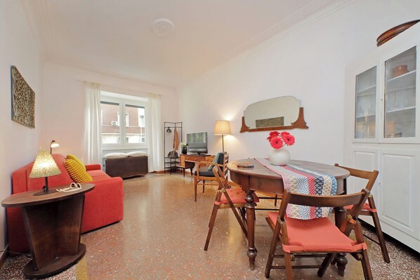 Apartment | Living area | 32-inch flat-screen TV with cable channels