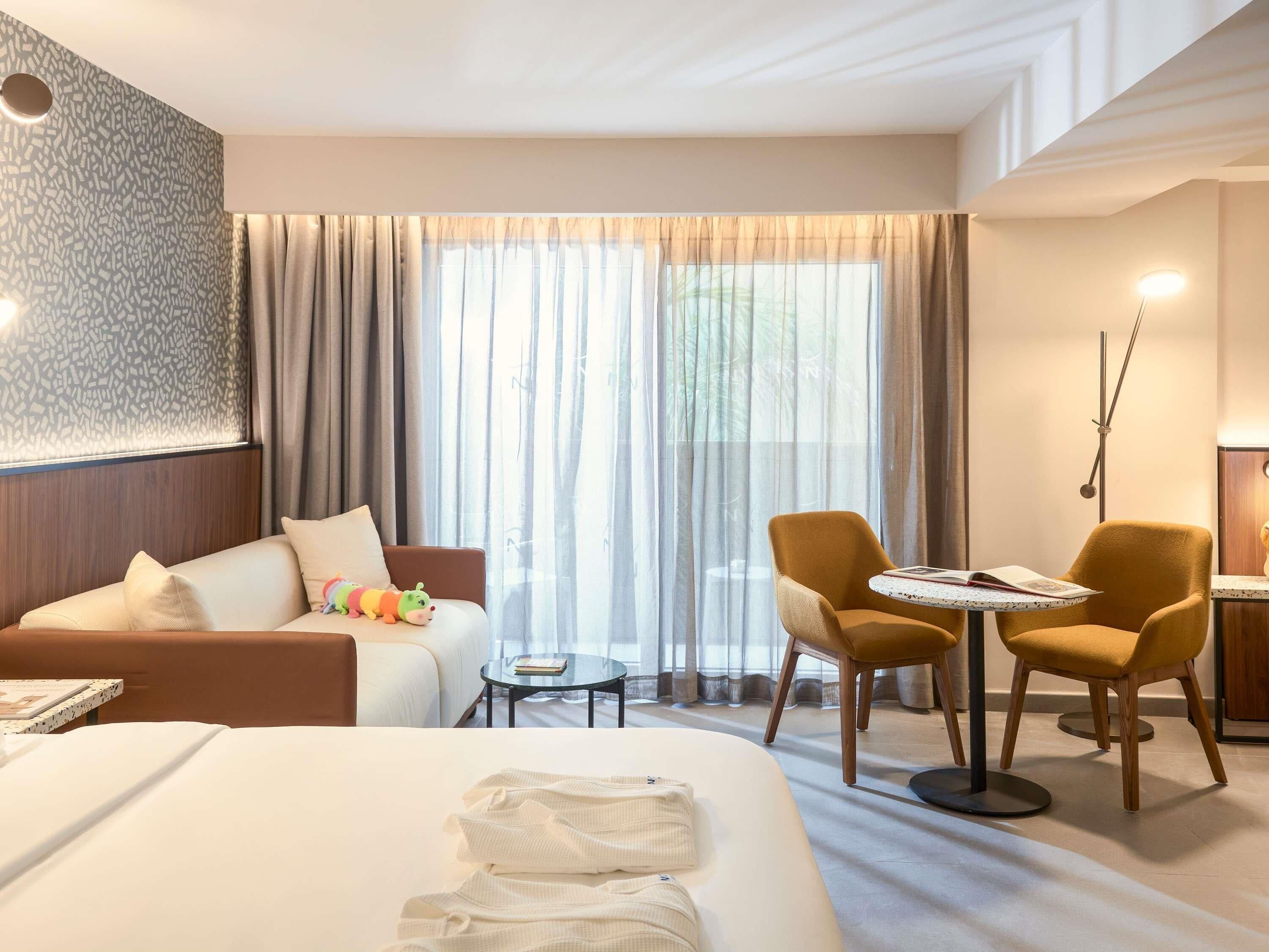 Family Room, 2 Double Beds | Premium bedding, individually decorated, individually furnished, desk