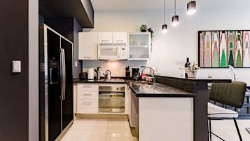 Fridge, microwave, stovetop, coffee/tea maker