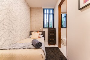 4 bedrooms, desk, iron/ironing board, travel cot