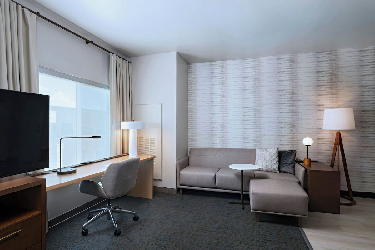 Suite, 1 Bedroom | Living room | 50-inch flat-screen TV with digital channels