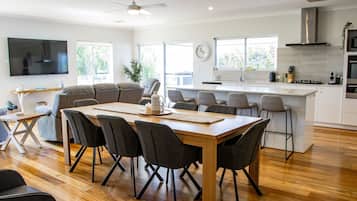 Microwave, oven, dishwasher, dining tables
