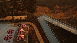 An aerial view of a hotel with a glass bridge connecting to a rooftop terrace. - BODBE Hotel (Sighnaghi)