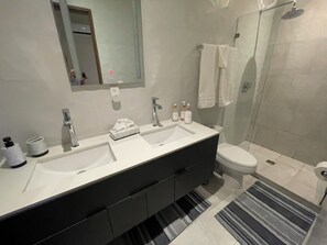 Shower, towels, soap, shampoo
