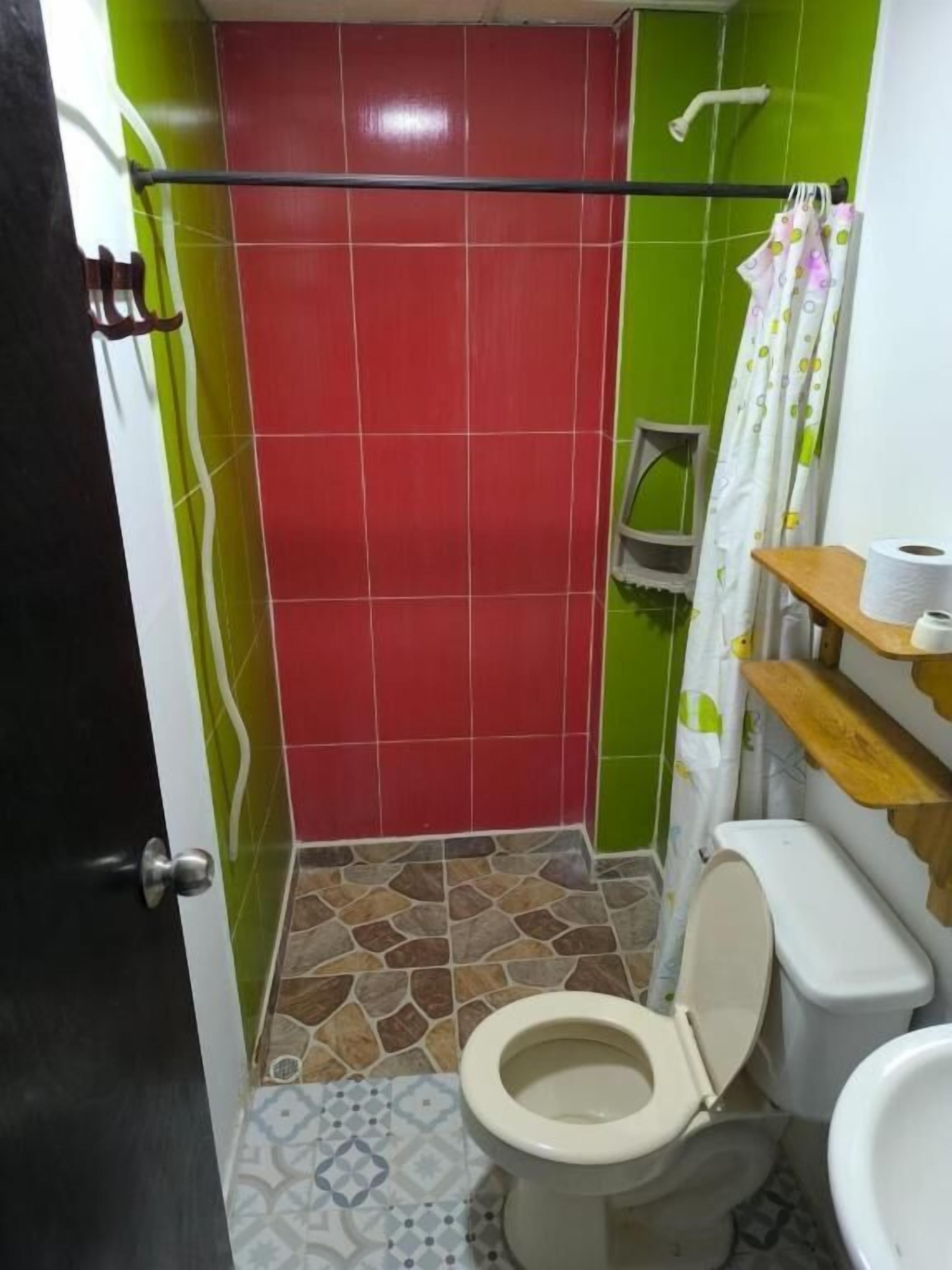 Shower, towels, soap, toilet paper