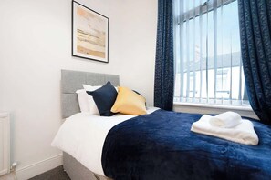 4 bedrooms, iron/ironing board, WiFi, bed sheets