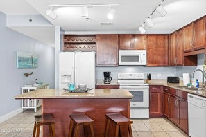 Fridge, microwave, oven, stovetop - Ease, Comfort and Tranquility at Lake Town Wharf Resort, Panama City Beach, FL (Panama City Beach)