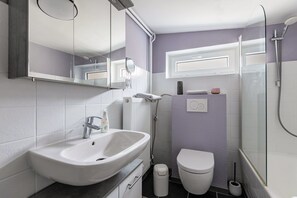 Ducha, secador de pelo, toallas