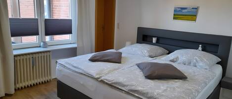 2 habitaciones, wifi gratis y ropa de cama