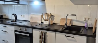 Appartement 'Haus Schmidt 4Zi Parknähe' met Balkon en WiFi