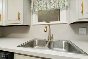 Microwave, oven, stovetop, dishwasher - Nicely Located 2-bedroom duplex apartment newly updated in Herington. (Herington)