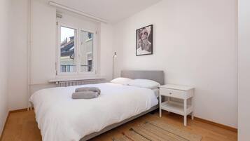 Premier-Apartment, 2 Schlafzimmer | 2 Schlafzimmer, Daunenbettdecken, Betten mit Memory-Foam-Matratzen