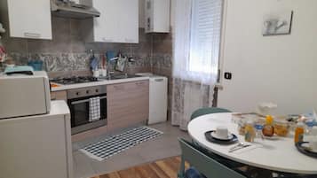 Microwave, stovetop, cookware/dishes/utensils, spices