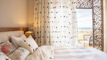 2 chambres, coffres-forts dans les chambres, fer et planche Ă repasser