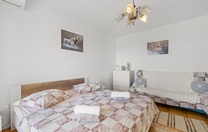 2 dormitorios, tabla de planchar con plancha, wifi gratis y ropa de cama