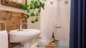 Premium-1 Queen, 2 Singles | Bathroom | Hair dryer, towels, soap, shampoo