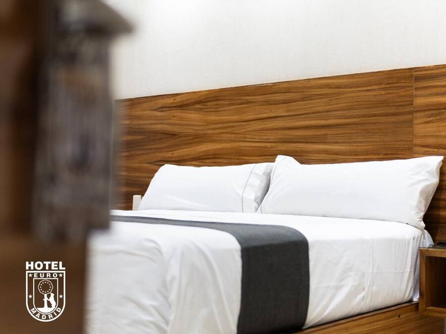 Laptop workspace, free WiFi, bed sheets