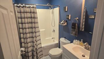 Hair dryer, towels, soap, toilet paper