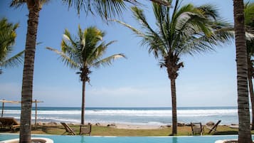 Outdoor pool, pool umbrellas, sun loungers