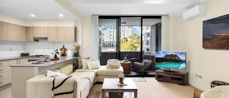 Appartement familial, balcon, vue sur le jardin | Aire de séjour