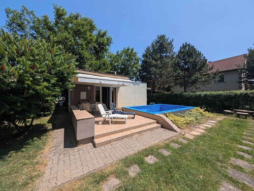 Maison de vacances avec climatisation, piscine, terrasse et WiFi