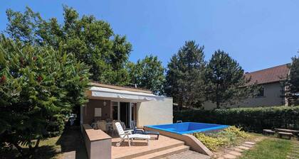 Maison de vacances avec climatisation, piscine, terrasse et WiFi