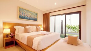 A hotel room with a large bed, a nightstand with a lamp, and a painting on the wall.