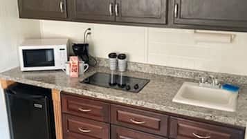 Fridge, microwave, stovetop, coffee/tea maker