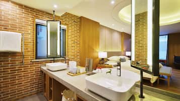 Luxury Double Room, Courtyard View | Bathroom | Shower, hair dryer, slippers, towels