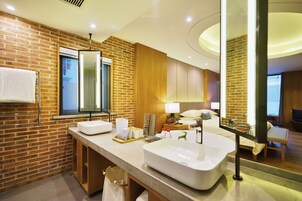 Luxury Double Room, Courtyard View | Bathroom | Shower, hair dryer, slippers, towels