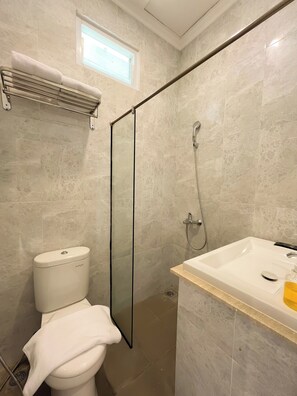 Shower, slippers, towels, soap