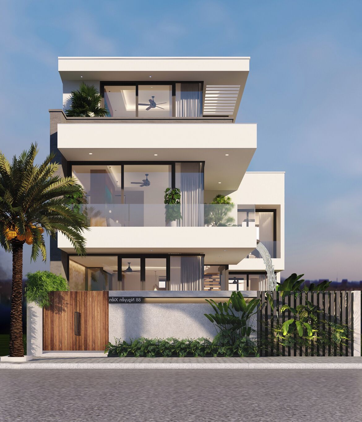 A modern multi-story residential building with balconies, large windows, and a gated entrance.