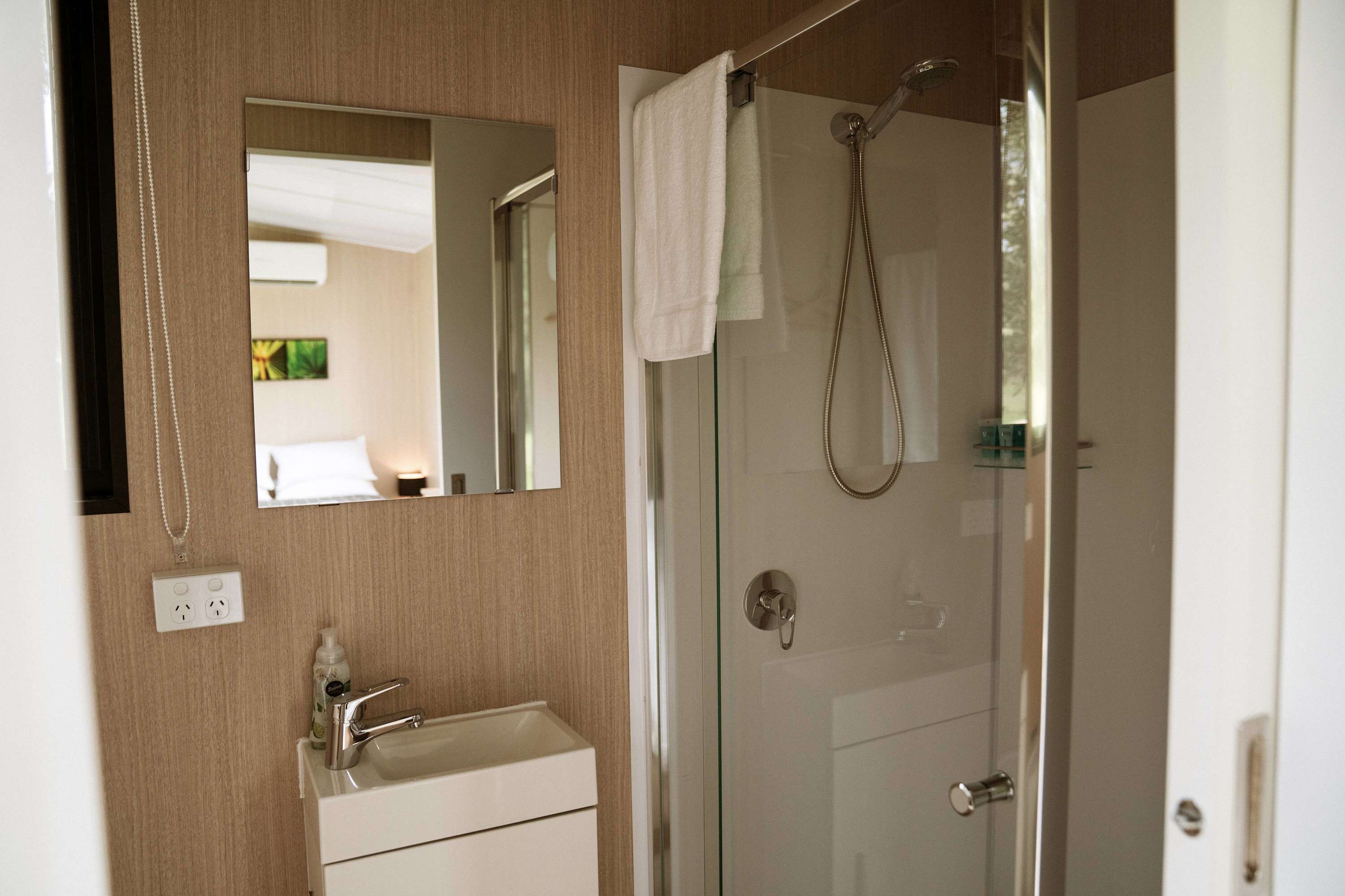 Shower, hair dryer, towels