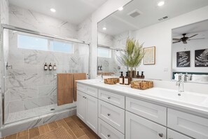 Shower, towels, soap, toilet paper